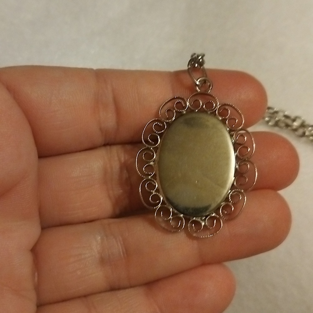 Vtg. left facing Mirrored Crystal Cameo black glass pendant w Silver tone chain - Picture 2 of 10